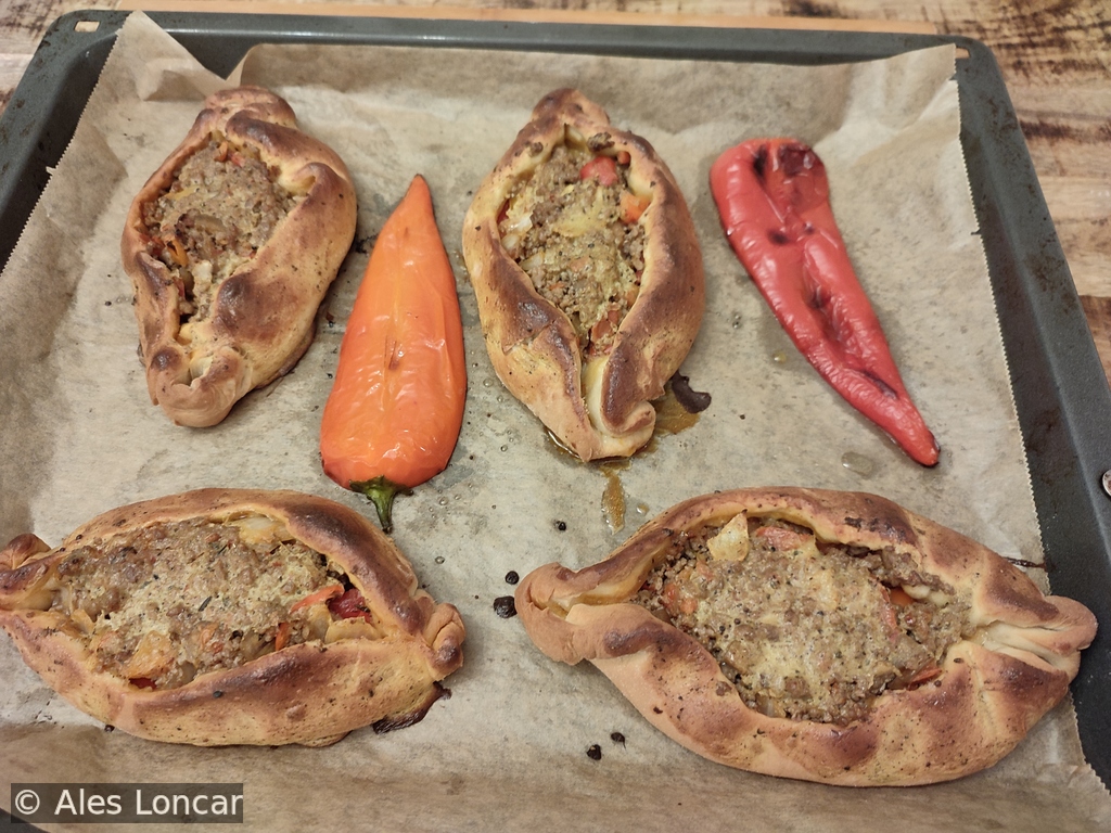 Freshly baked Etli Pide. The crust is perfectly golden-brown and crispy on the ridges, yet remains wonderfully soft to the bite.