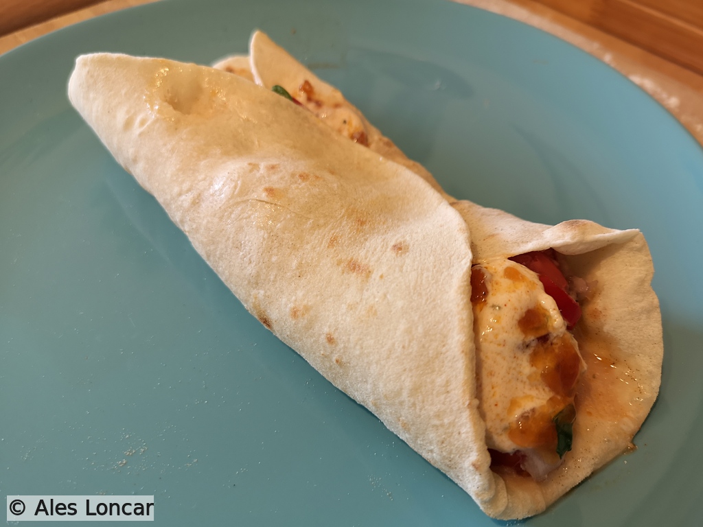 Tucked in, rolled up, and ready to enjoy. Fresh sourdough flatbreads really do make all the difference—plenty of elasticity and absolutely no tearing!