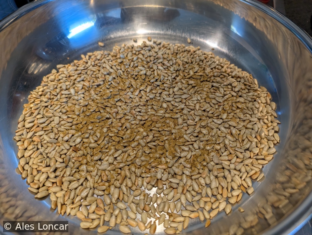 Spicy quinoa salad with caramelized sunflower seeds