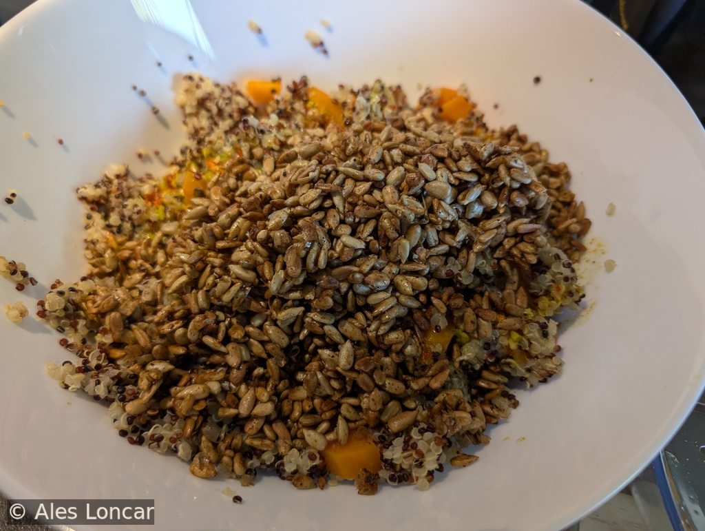 Spicy quinoa salad with caramelized sunflower seeds
